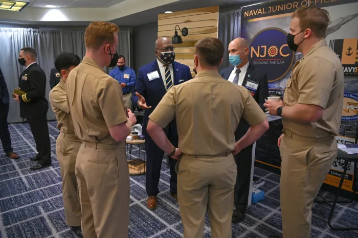 VADM (ret.) Rick Hunt, President of SNA, and RADM (ret.) JC Caesar meet and discuss with members of the Naval Junior Officer Counsel at SNA 2022.  NJOC is a new management advisory group designed to bridge the communications gap between junior and senior leaders. (U.S. Navy photo by Michael Walls)