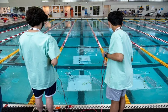 Participants operate their remotely operated vehicles (ROVs) through an underwater course during the annual International SeaPerch Challenge on June 4 at the University of Maryland in College Park, Maryland. The Office of Naval Research-sponsored competition brought together students to showcase the ROVs they built as part of a curriculum designed to boost their skills and interest in science, technology, engineering and math. (U.S. Navy photo by Michael Walls)