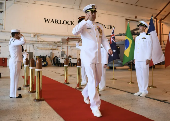 Capt. Andy “Big Tuna” Berner salutes as he prepares to be sworn in as the new Office of Naval Research Global commanding officer (CO). During a July 13 change-of-command ceremony at Naval Air Station Patuxent River, Maryland, Berner took over for outgoing CO Capt. Matthew Farr. 