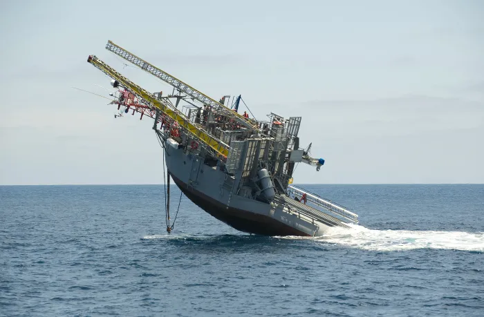 The Department of the Navy's Floating Instrument Platform (FLIP) begins the process of transitioning from horizontal to vertical during a cruise commemorating 50 years of continuous service to the scientific community. 