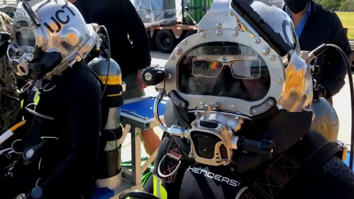 U.S. Navy divers test the Divers Augmented Vision Display (DAVD) during a training exercise in Little Creek, Virginia. Outfitted with components such as a heads-up display resembling virtual-reality glasses (which can be adapted to any Navy dive helmet), DAVD enables divers to better operate in inhospitable underwater environments. (Photo courtesy of Coda Octopus)
