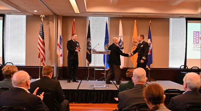 Lt. Cmdr. Richard D. Harvey (right) receives his Junior Officer of the Year award from the Reserve Organization of America for his service at the Office of Naval Research. (Photo courtesy of Lt. Cmdr. Richard D. Harvey)