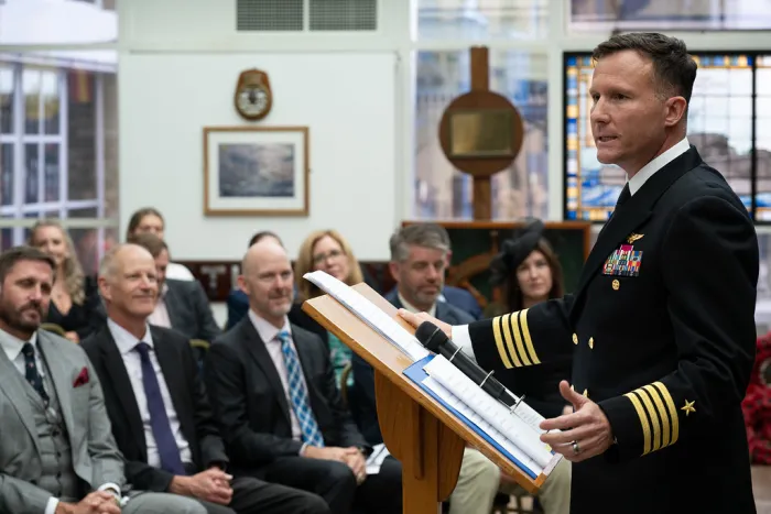 Capt. Eric “Nutt” Hutter gives his first official remarks as the leader of the Office of Naval Research Global during a Change of Command ceremony at the HMS President, a shore establishment of the Royal Naval Reserve in London, Sept. 4. (U.S. Air Force photo by Airman 1st Class Adam Enbal, 501st Combat Support Wing)