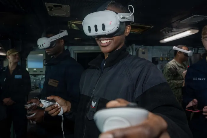 U.S. Navy Quartermaster 3rd Class Zinnia Bank participates in a virtual navigation demonstration using the ONR Global TechSolutions-sponsored Virtual Bridge and Nautical Trainer (VIBRaNT), held in the pilot house of the Nimitz-class aircraft carrier USS Theodore Roosevelt (CVN 71). (U.S. Navy photo by Mass Communication Specialist Seaman Alexia Mezick)