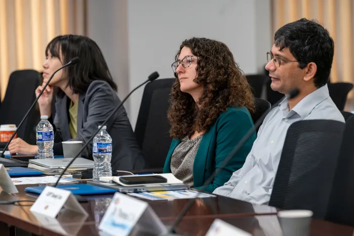 Drs. Akane Sano, Anna Tarakanova and Joydeep Biswas listen to remarks.