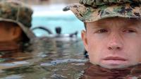 A U.S. Marine, enrolled in the Marine Combat Diver course, waits to participate in the next evolution in the pool at the Navy Diving & Salvage Training Center.