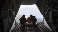 An Air-Deployable Expendable Ice Buoy (AXIB) is deployed in the high Arctic near the North Pole.