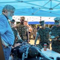 U.S. Marines and U.S. Navy Sailors assigned to II Marine Expeditionary Force are briefed on the Autonomous Casualty Evacuation System during Technology Operational Experimental Exercise (TOEE) 22 on Marine Corps Base Camp Lejeune, North Carolina, August 4, 2022. (U.S. Marine Corps photo by Cpl. Eric Ramirez)