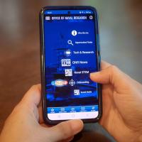 A user tries out the new ONR Mobile app on a phone after downloading it from an app store.