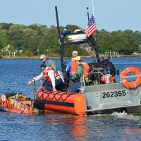 Princeton engineering students prepare their unmanned boat for the PEP Races in Virginia Beach. (Photo courtesy of Dr. Steven Russell, ONR)