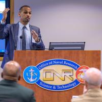 Dr. Kareem Ahmed, a professor at the University of Central Florida, speaks during the DoN HBCU/MI Program’s Distinguished Fellows Symposium, held at the Office of Naval Research, in Arlington, Virginia. (U.S. Navy photo by Michael Walls)