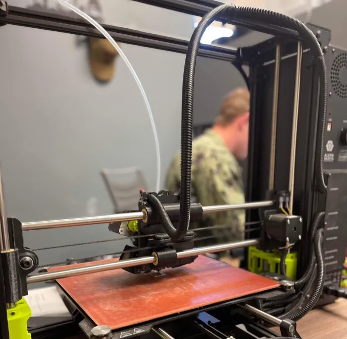 AZ2 (AW) Jonathan Ziminski at the Naval Aviation Maintenance Center for Excellence Training (NAMCE-T) at Point Mugu, California, works on creating a training replica of an E-2D Advanced Hawkeye.